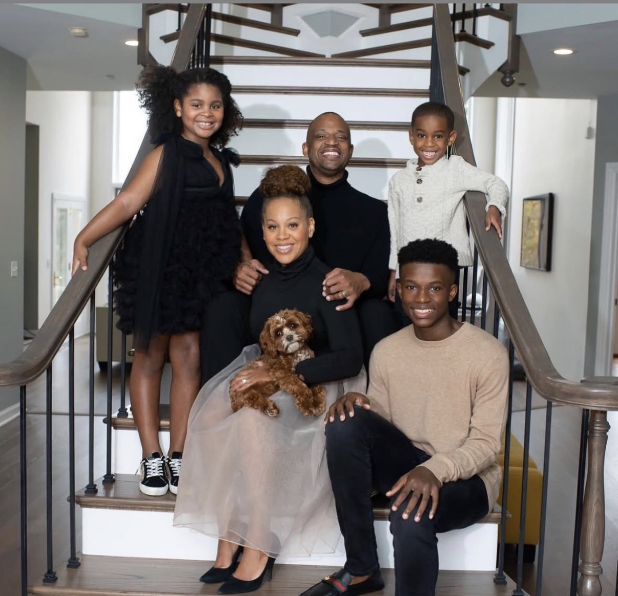 Ashaunte McLean with his wife and children at home